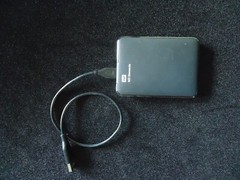WD Elements VD8UZG0010BBK-D4. Made in Malaysia.
